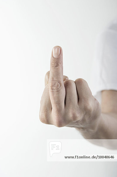 Close-Up Of a man's hand showing obscene gesture  Bavaria  Germany