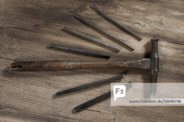 Close-up of punches with hammer in workshop  Bavaria  Germany