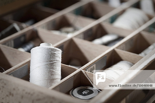 Reels of sewing threads in box  Bavaria  Germany