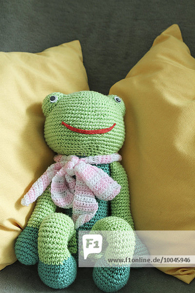 Crocheted frog figurine