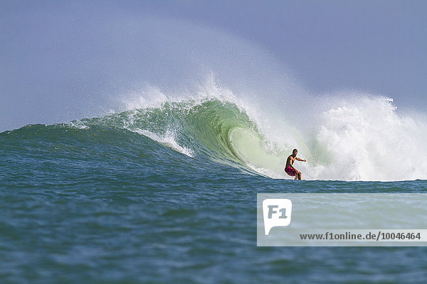 Indonesia Bali Surfing a wave