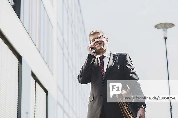 Businessman using mobile phone