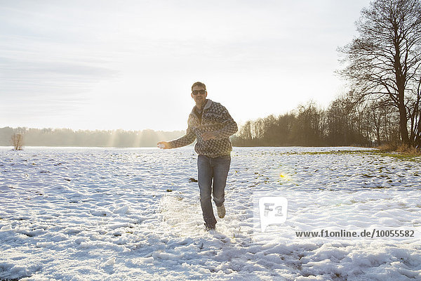 Man enjoying nature in winter  Teising  Bayern  Deutschland
