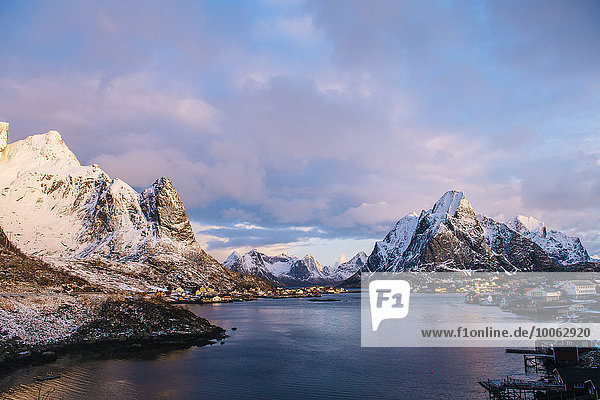 Coastline and snow-capped mountains  Reine  Norway