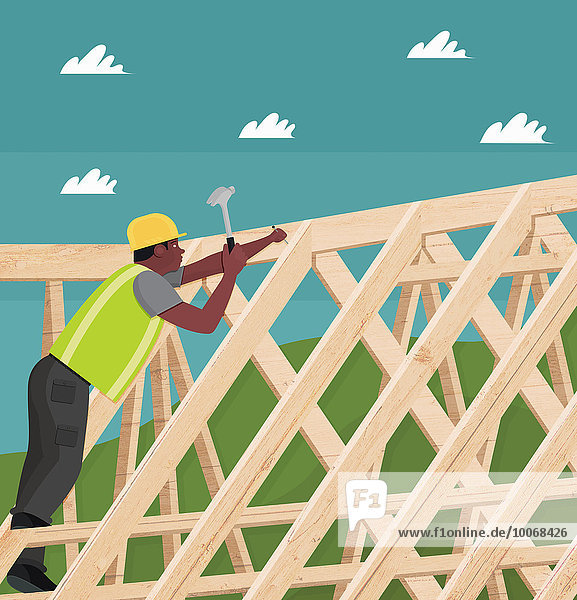 Bauarbeiter hämmert einen Nagel in eine Dachlatte