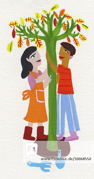 Junges Paar pflanzt zusammen einen Baum