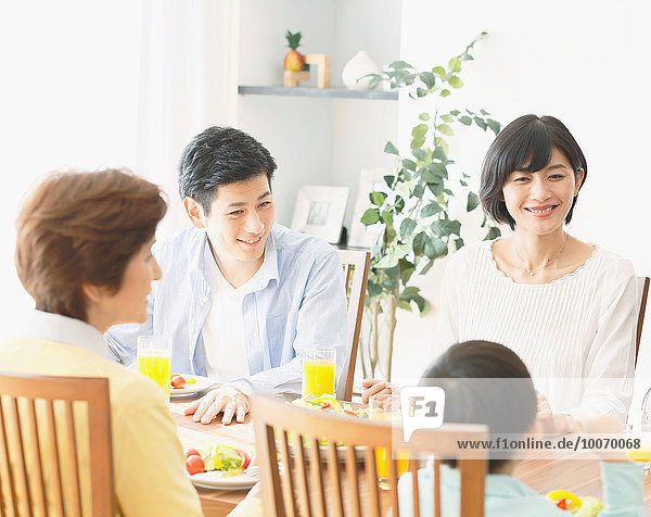 Japanese family together in the kitchen