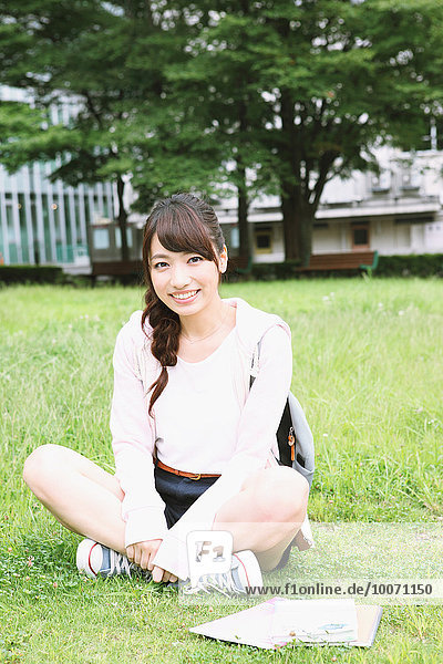 Young attractive Japanese female University student portrait