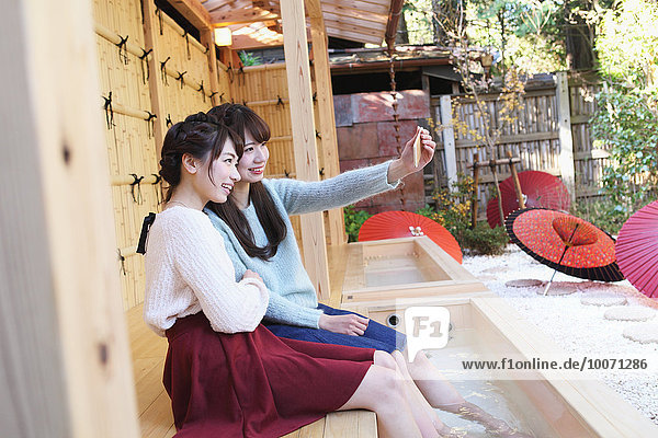 Young Japanese women enjoying foot spa in Kawagoe  Japan