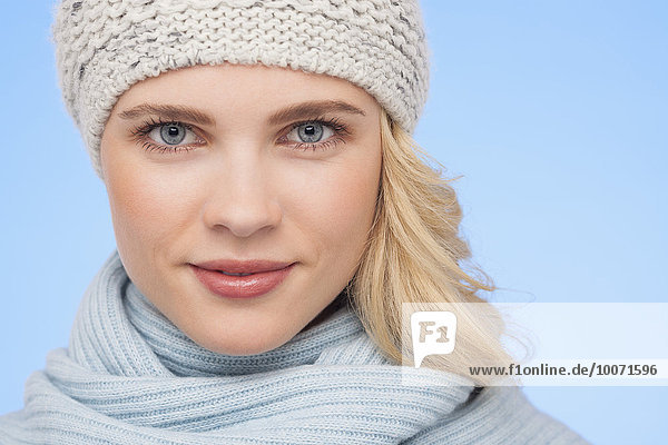Portrait of a beautiful woman in knitted hat