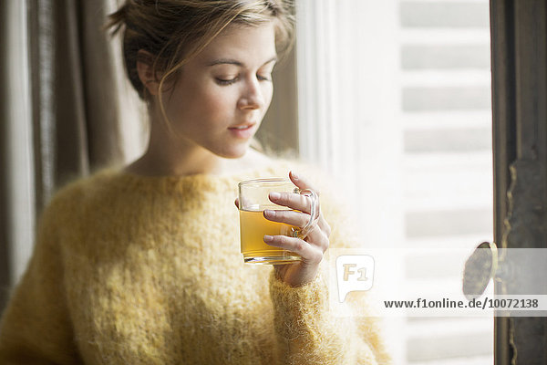 Woman drinking herbal tea