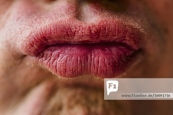 Close up of lips of pouting Caucasian man