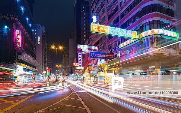 Traffic light trails at night  Hong Kong  China