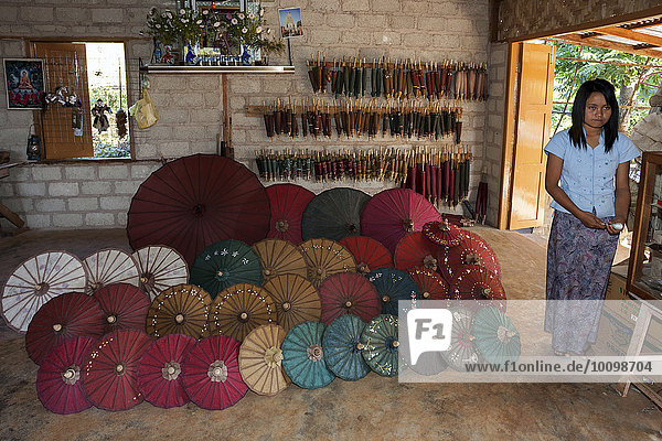 Finished umbrellas in an umbrella factory  near Heho  Shan State  Myanmar  Asia