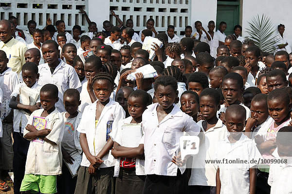 Students in schoolyard during morning assembly  Kasongo-Lunda  Kawongo district  Bandundu Province  Congo Republic