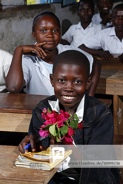 Students in class  with a bouquet  Zhinabukete  Kawongo district  Bandundu Province  Congo-Brazzaville  Africa