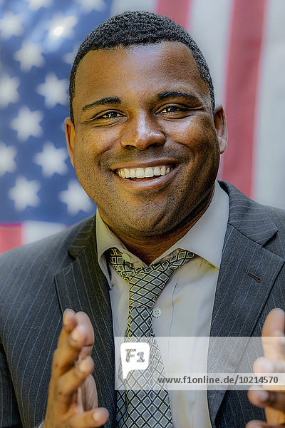 Close up of Black politician smiling