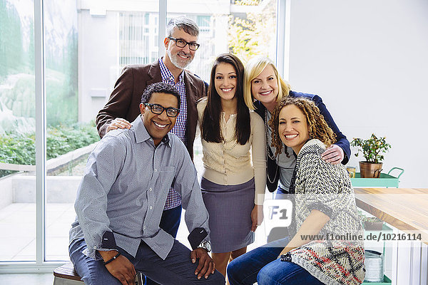 Business people smiling in office