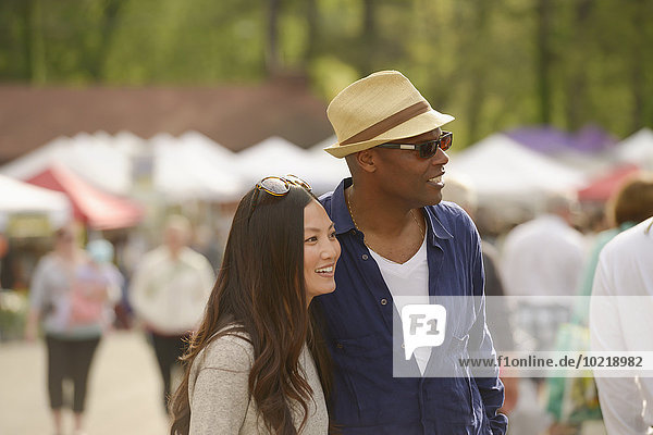 Couple shopping at farmers market