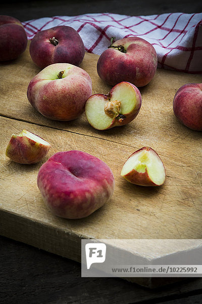 Vineyard peaches on chopping board