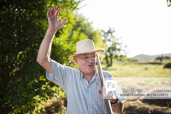 Portrait of greeting farmer