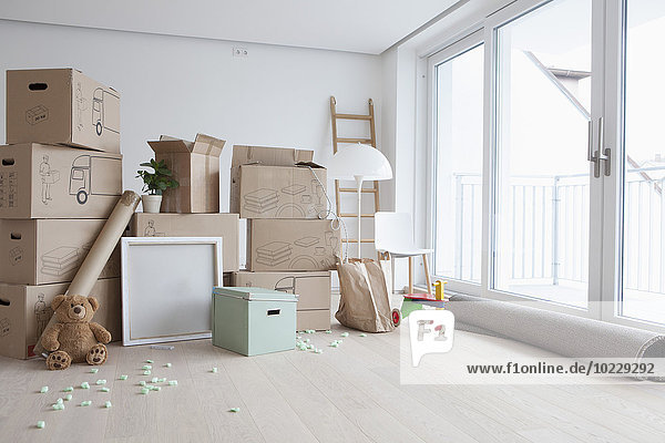 Piled cardboard boxes in flat