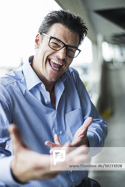 Portrait of successful businessman freaking out
