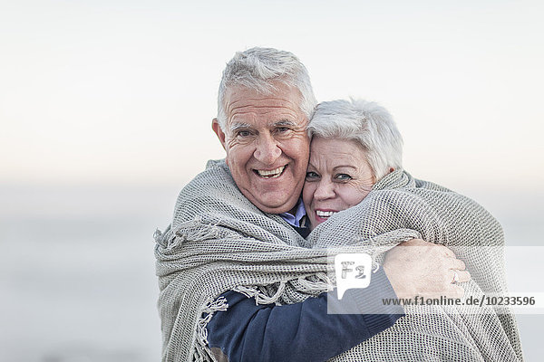 South Africa  Cape Town  portrait of senior couple on the beach