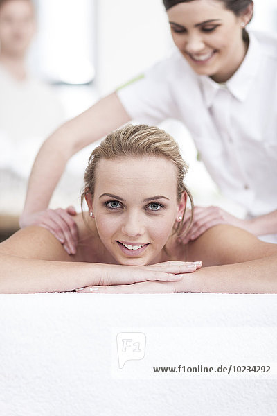 Young woman getting a massage in a spa