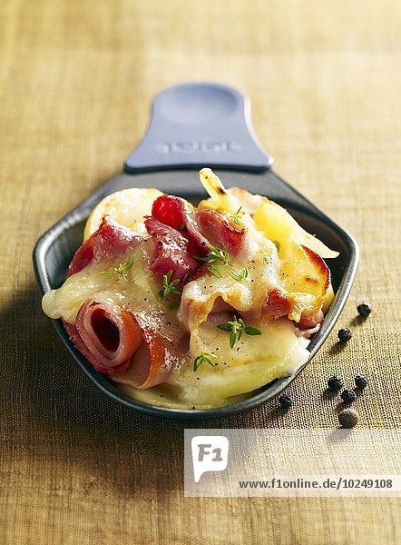 Raclette in a small casserole dish
