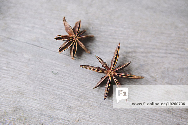 High angle view of star anise on wooden table