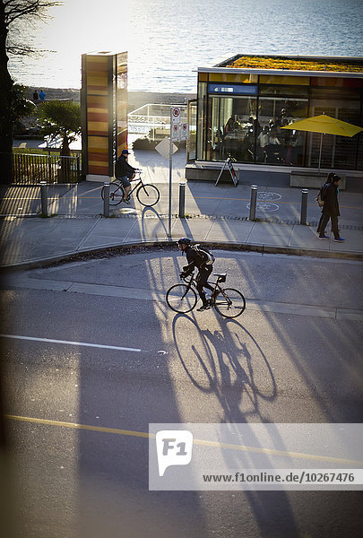 Sonnenuntergang Fahrradfahrer Bucht British Columbia Kanada englisch Vancouver