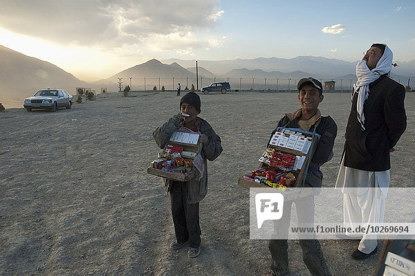 Afghan Boys Selling Cigarettes And Candy On The Tapa Maranjan Ridge In Kabul  Afghanistan