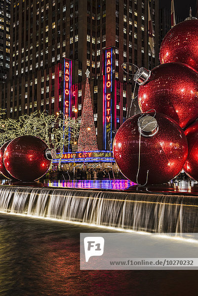 Christmas decorations near Radio City Music Hall; New York  New York  United States of America