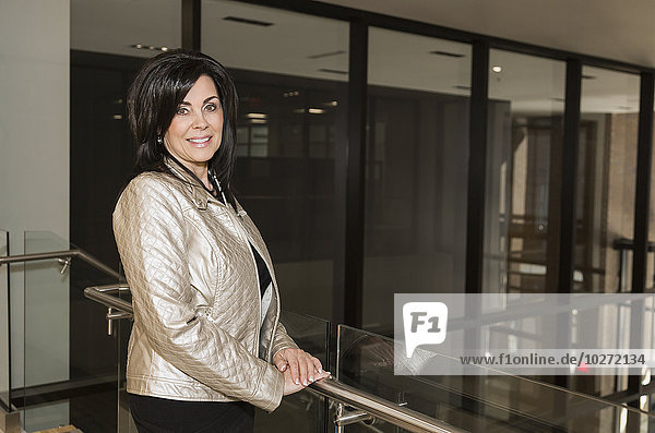 'Portrait of professional businesswoman in office setting; Edmonton  Alberta  Canada'