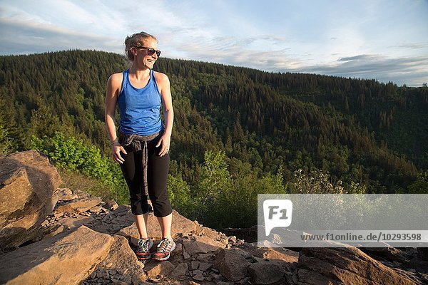 Woman enjoying view on hill  Angel's Rest  Columbia River Gorge  Oregon  USA