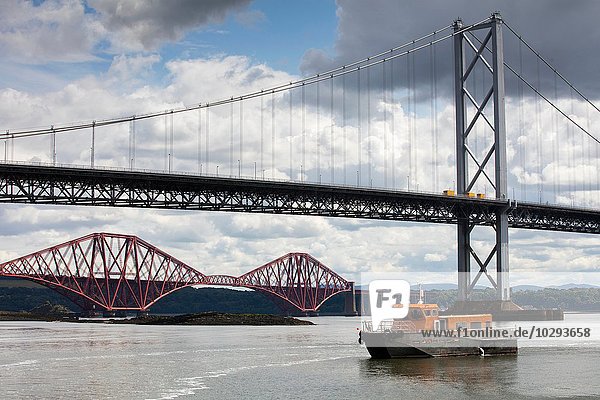 Forth Road Bridge and the Forth Rail Bridge near Queensferry  Scotland  UK