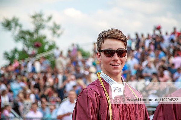 Portrait of young man at graduation ceremony