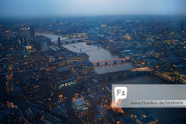 Aerial cityscape of river Thames and bridges at dawn  London  England  UK