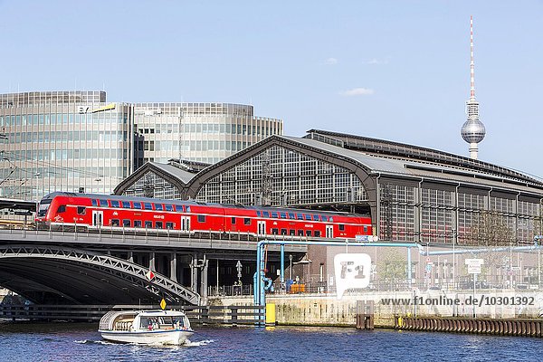Sightseeing boat on the river Spree  Friedrichstrasse station with TV tower in Berlin-Mitte  Berlin  Germany  Europe