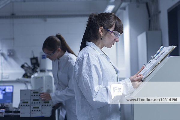 Two female technicans working in a technical laboratory