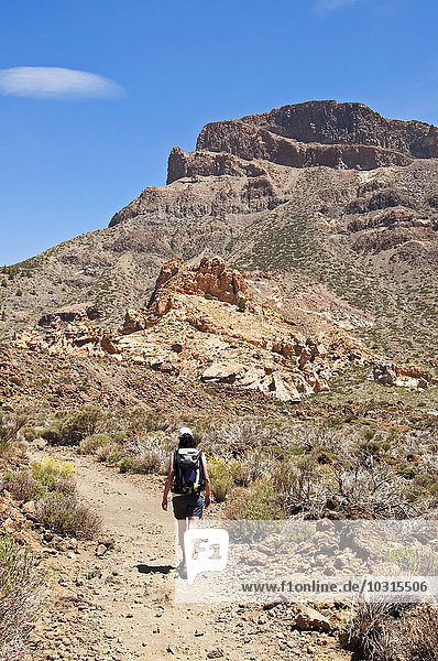 Spain  Canary Islands  Tenerife  Los Roques de Garcia  Teide Nation Park  female hiker