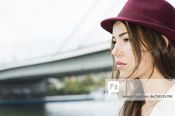 Young woman wearing hat
