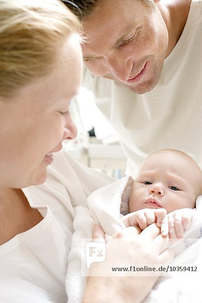 Parents and newborn baby