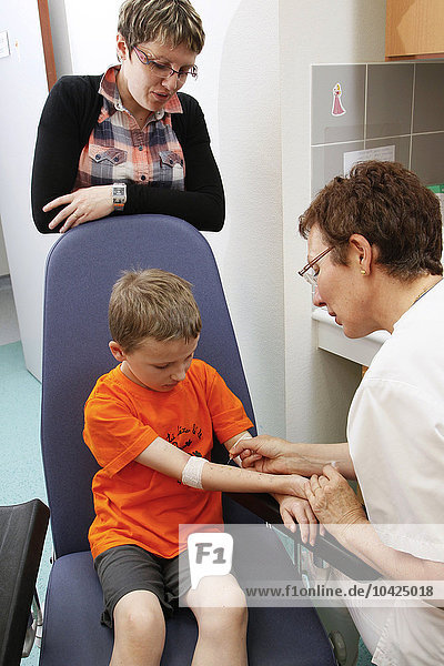 To be used only in the context of the feature. Feature shot at the allergology department of Saint-Vincent de Paul hospital  GHICL  Lille. Food allergy in a child. Prick test using reference allergens  on a boy´s skin.