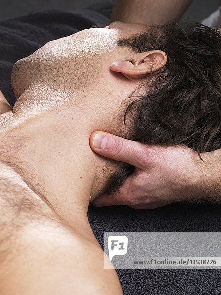 Close up of man having neck massage