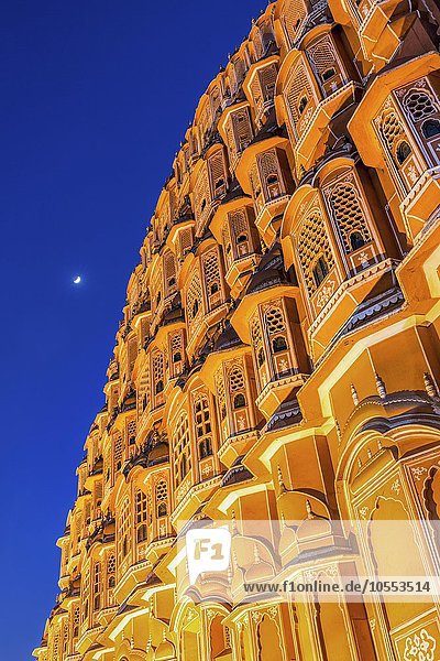 Facade of the Hawa Mahal  Palace of the Winds  at dusk with moon  Jaipur  Rajasthan  India  Asia
