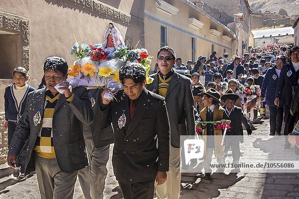 Procession during a fiesta in Colquechaca in Potosi  Bolivia  South America