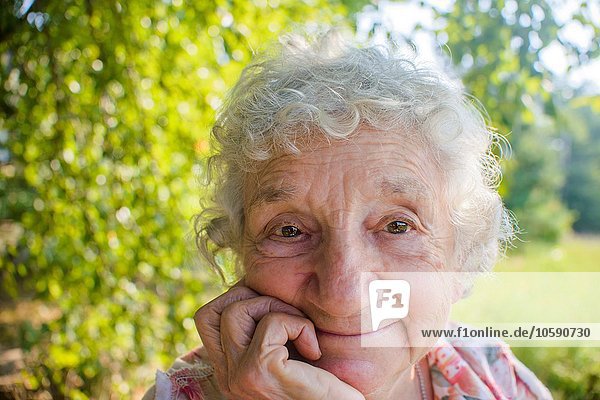 Close up of smiling senior woman outdoors