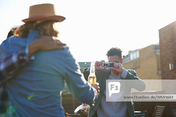 Dach,Mann,Freundschaft,Party,fotografieren,jung